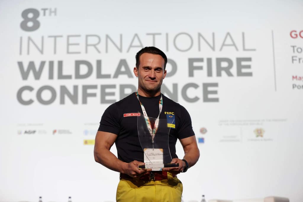 Delegates on stage at the International Wildland Fire Conference